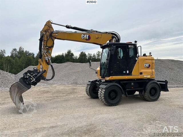 Raupenbagger Caterpillar M315 wheel digger w/ tilt and bucket