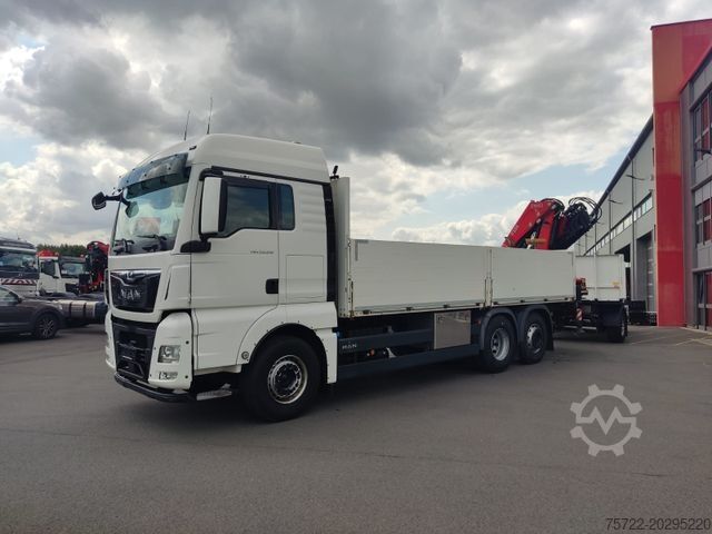 Flatbed truck MAN TGX 26.510 6x2-4 Baustoff-Zug mit Fassi F235