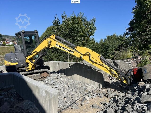 Crawler excavator New Holland E55B excavator w/ digging bucket, sanding bucket,