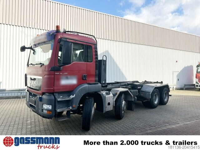 Abrollkipper MAN TGS 35.400 8x4 BL, Schub-Knick bis 6,5m Container