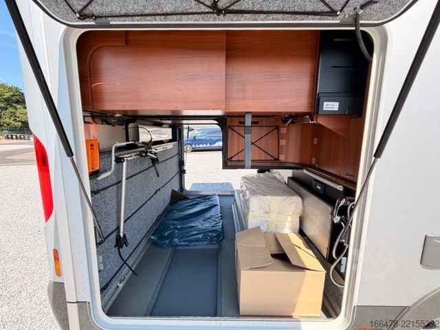 Integriertes Wohnmobil CARTHAGO Liner For Two 53 Iveco *Rundsitzgruppe-Hubbett*