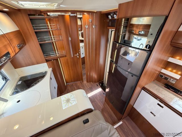Integriertes Wohnmobil CARTHAGO Liner For Two 53 Iveco *Rundsitzgruppe-Hubbett*