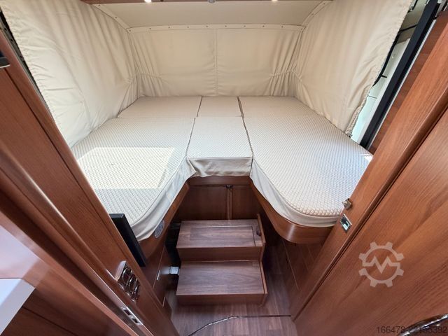 Integriertes Wohnmobil CARTHAGO Liner For Two 53 Iveco *Rundsitzgruppe-Hubbett*