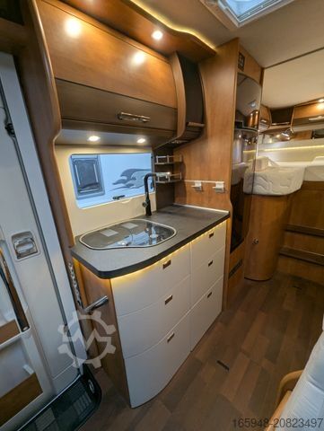 Teilintegriertes Wohnmobil CARTHAGO C-Tourer T 143 "Tankflaschen"auf autark getrimmt