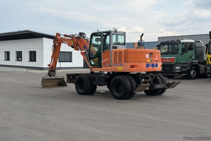 Straßenwalze Hitachi FH120W Mobilbagger / Swiss-Vehicle