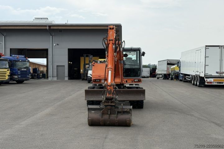 Straßenwalze Hitachi FH120W Mobilbagger / Swiss-Vehicle