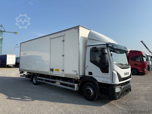 Truck with flatbed and retractable tail lift iveco eurocargo