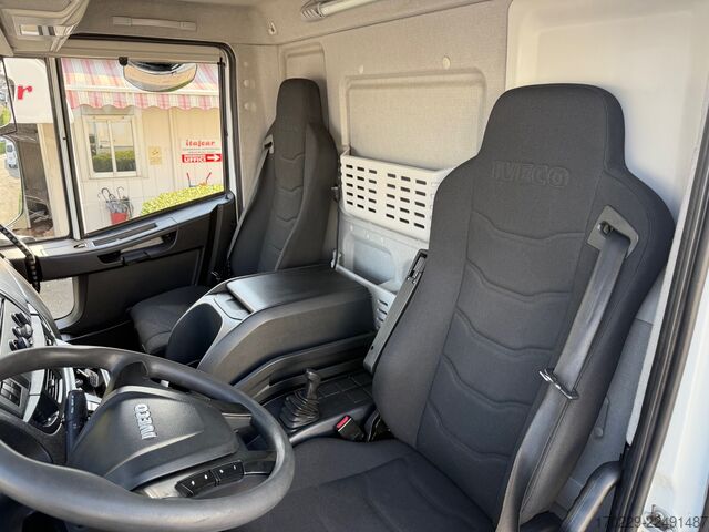 Truck with flatbed and retractable tail lift iveco eurocargo