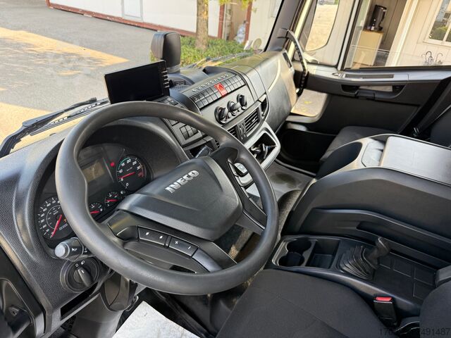 Truck with flatbed and retractable tail lift iveco eurocargo