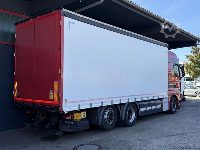 Flatbed truck with tarp MAN TGX 26.480 XXL Euro6Retarder 7,28m Festaufbau!