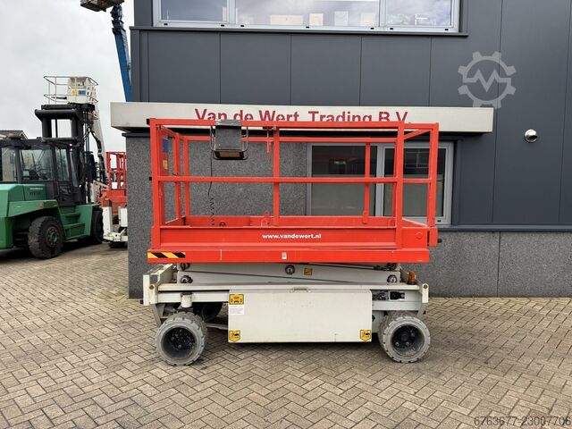 Holland-Lift Y 64 EL 14 Scissor lift / Scissor lift 8.4M Working height Electric 2015 Holland Lift Y 64 EL 14 Schaarhoogwerker / Sciccor lift 8.4M We