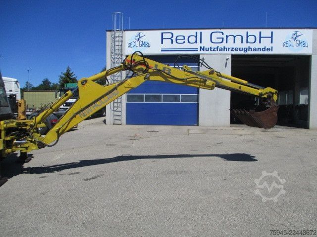 Backhoe loader NEW HOLLAND LB 115-4PS, Reifen neuwertig