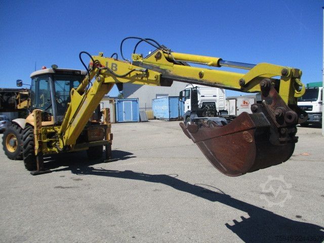 Backhoe loader NEW HOLLAND LB 115-4PS, Reifen neuwertig
