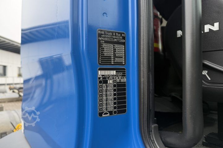 Roll-off tipper truck MAN TGS 35.500 8x2 Palfinger / Swiss-Vehicle