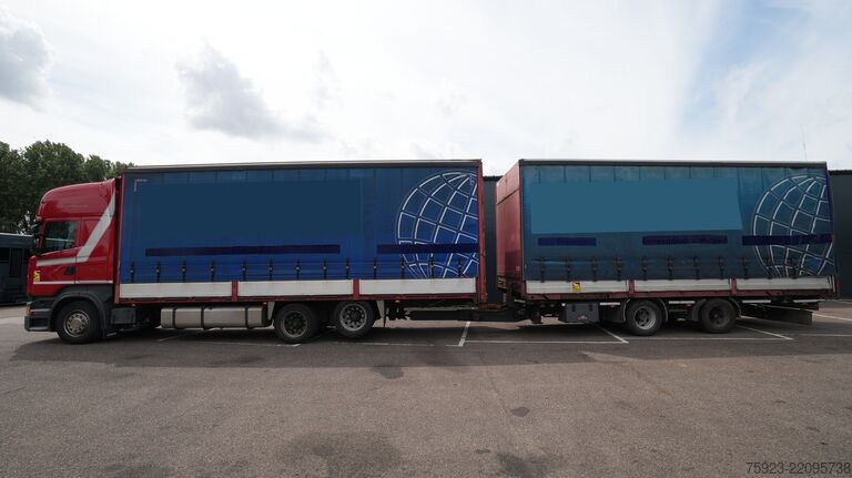 Sliding tarpaulin Scania R 400 6x2 curtainside in combo with Burg trailer