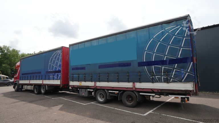 Sliding tarpaulin Scania R 400 6x2 curtainside in combo with Burg trailer