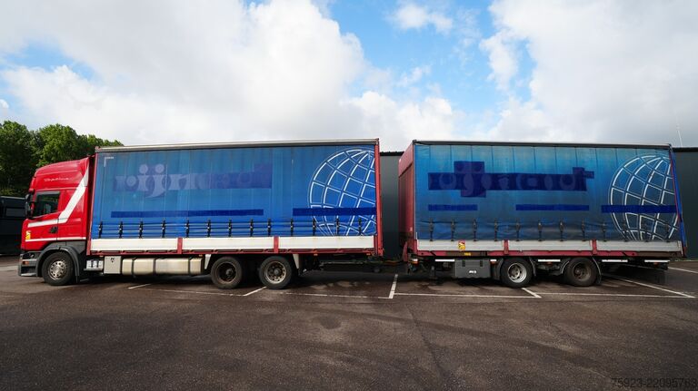 Sliding tarpaulin Scania R 400 6x2 curtainside in combo with Burg trailer
