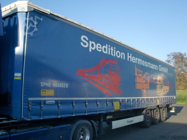 Semi-trailer with flatbed & tarpaulin Krone SDP 27 Coil 8.600 bahnverladbar