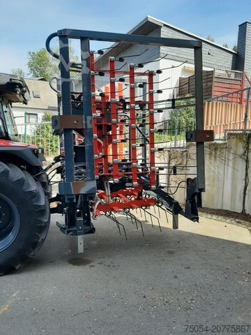 Field cultivator  Grünlandstriegel mit Drillstar