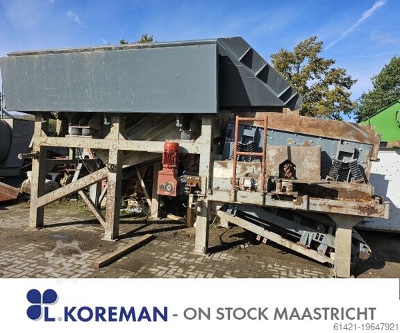 Kleemann hopper with vibrating chute