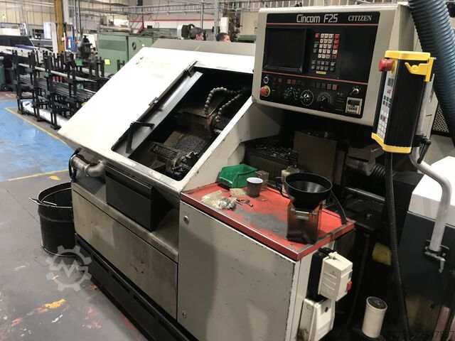 Sliding head CNC lathe with bar feed Citizen Cincom F25