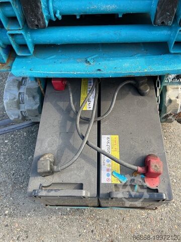 Gebrauchte Scherenarbeitsbühne auf Ketten Airman ENCL045 AIRMAN Encl.045