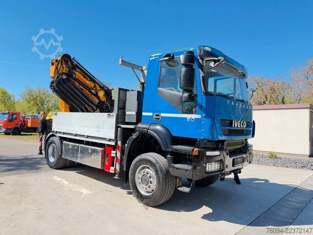 Flatbed truck IVECO Trakker 360 4x4 Pritsche Kran 27m AHK