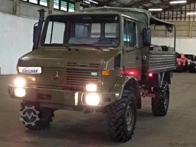 Flatbed truck MERCEDES-BENZ Unimog U 1300 L Turbo OM 366 Pritsche 4x4