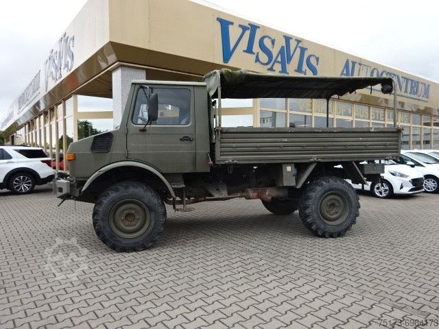 Flatbed truck MERCEDES-BENZ Unimog U 1300 L Turbo OM 366 Pritsche 4x4
