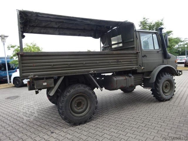 Flatbed truck MERCEDES-BENZ Unimog U 1300 L Turbo OM 366 Pritsche 4x4