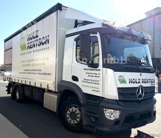 LKW mit Pritsche & Plane MERCEDES-BENZ 2530 ANTOS, Wingliner li., 6x2, Lenkachse