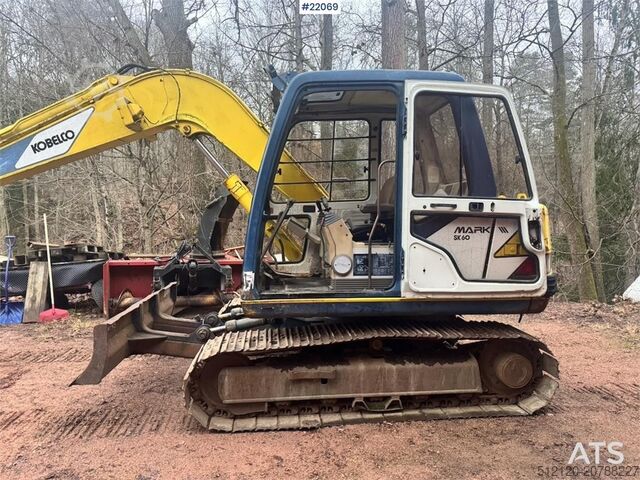Raupenbagger Kobelco SK60 crawler excavator with bucket