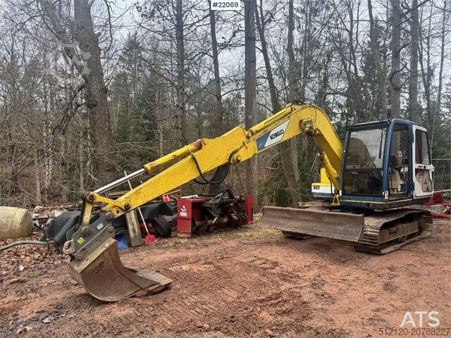 Raupenbagger Kobelco SK60 crawler excavator with bucket