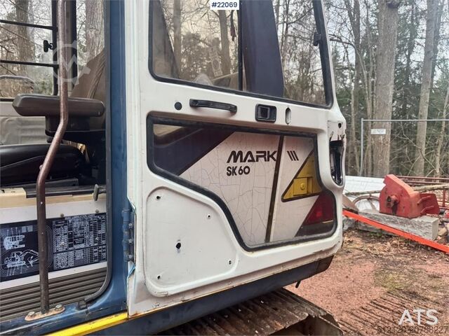 Raupenbagger Kobelco SK60 crawler excavator with bucket