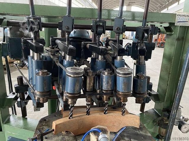 4-spindle vertical drilling machine for curved pieces such as chair backs or similar  