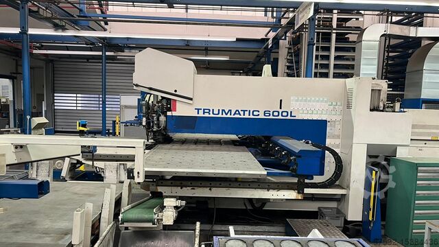 Laser cutting machine TRUMPF TruMatic 600 included Sheetmaster 2,4 KW. Year 2001. LOW PRICE