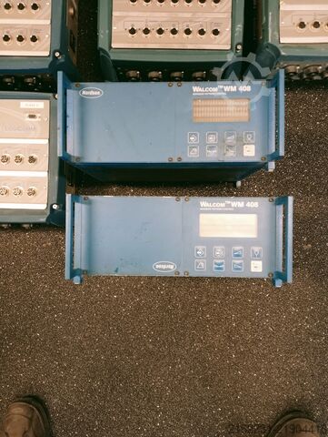 Cardboard packaging machine Nordson Logicomm control system