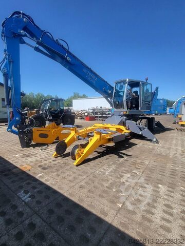Material handler Fuchs MHL 331 + Powerhand VRS200