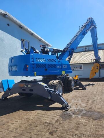 Material handler Fuchs MHL 331 + Powerhand VRS200