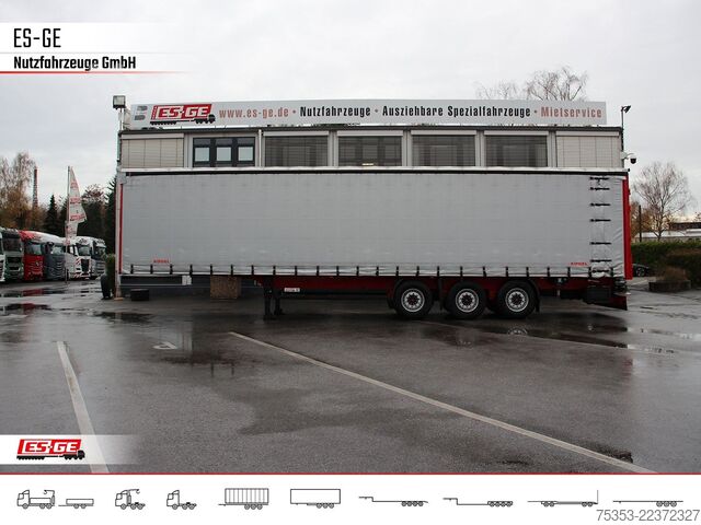 Open semitrailer with tarp KÖGEL 3-Achs-Cargo-Coil-Pritschensattelanhänger