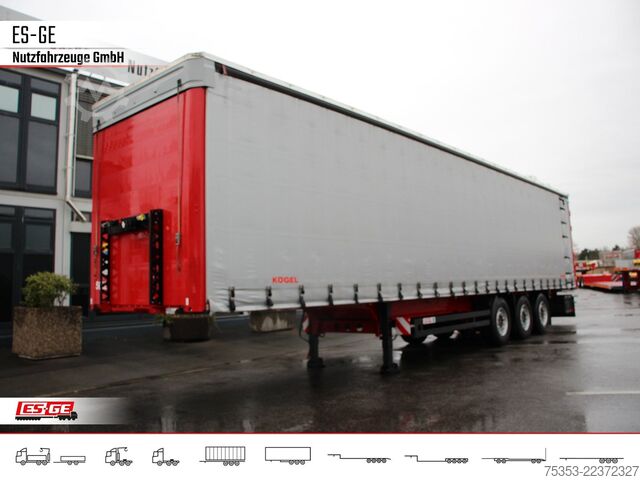 Open semitrailer with tarp KÖGEL 3-Achs-Cargo-Coil-Pritschensattelanhänger