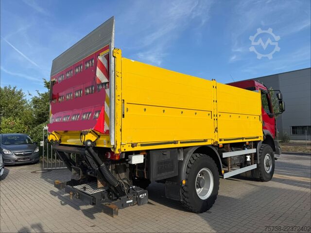Flatbed truck RENAULT Midlum 280 DXI 4x4 Pritsche+LBW/BLATTFEDERUNG