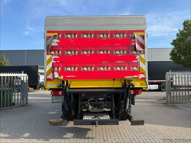 Flatbed truck RENAULT Midlum 280 DXI 4x4 Pritsche+LBW/BLATTFEDERUNG