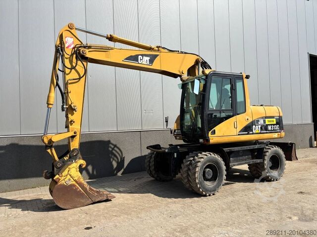Wheel excavator Caterpillar M 313 C (Low verified hours)