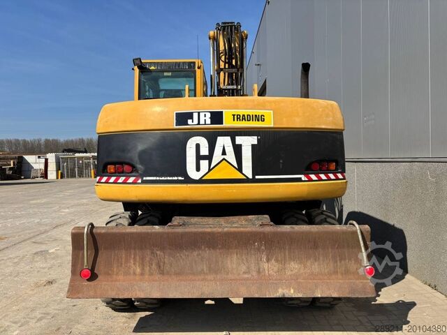 Wheel excavator Caterpillar M 313 C (Low verified hours)