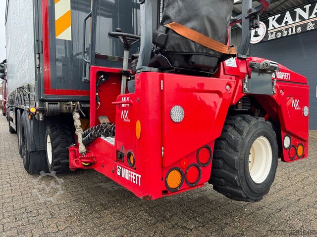 Flatbed truck with tarp MAN 26.470 XXL TGX  Mitnahmestapler Moffett M4 NX