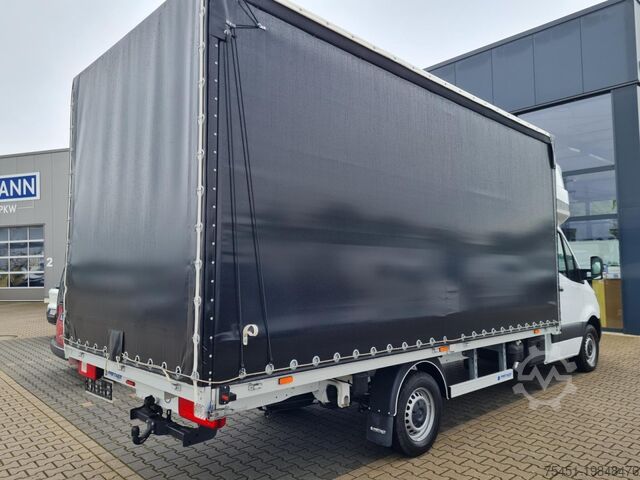 Transporter mit Pritsche & Plane Mercedes-Benz Sprinter 317 AG Schiebe Plane Schlafkab 10 Pal AHK