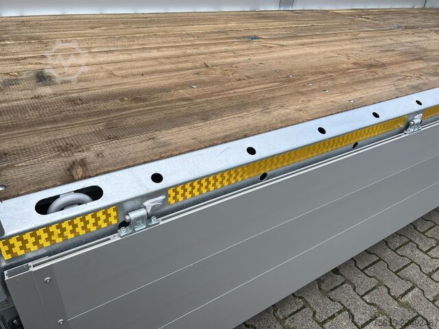 Open trailer Möslein THT 11- G 6,2  Tandem Pritsche- Tieflader mit Rungentaschen