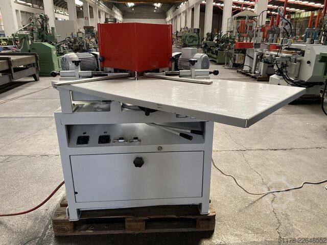 Double tilting vertical cutting machine  