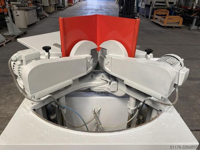 Double tilting vertical cutting machine  